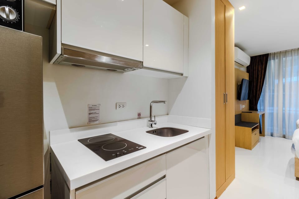 Apartment, Balcony, Pool View | Private kitchen
