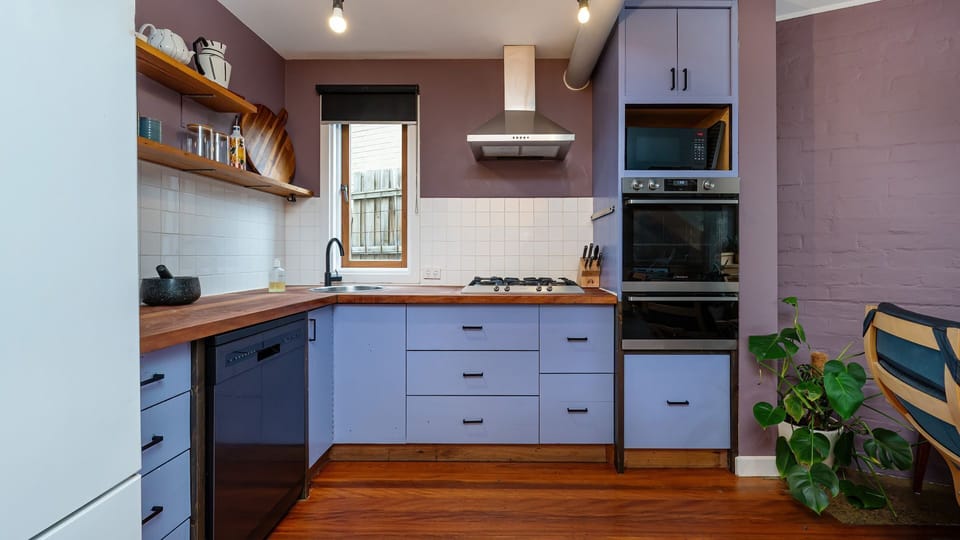 Fully equipped kitchen. Complete with an oven, gas cooktop, dishwasher, and plenty of storage for your stay.