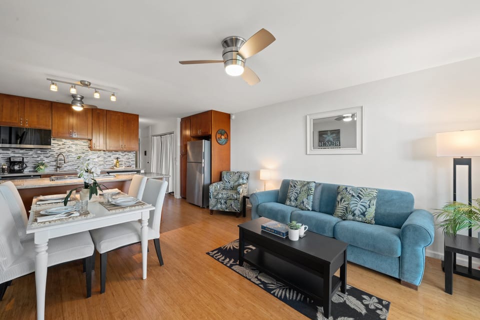 Relax in the stylish living room with bamboo flooring and a cool ceiling fan. Easy access to the updated kitchen just steps away