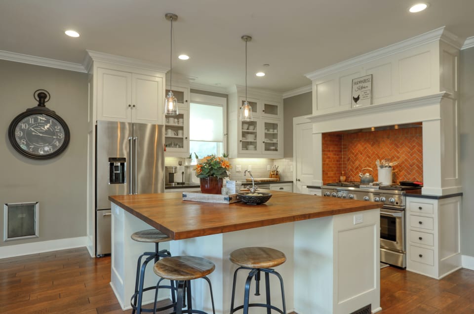 A magnificent, chef-ready kitchen that is beautifully appointed and fully stocked for all your culinary needs. The expansive center island and integrated breakfast bar provide exceptional space for both preparing meals and gathering