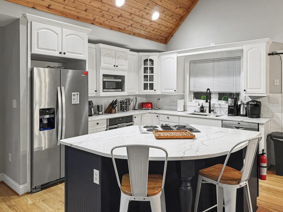 Fully equipped kitchen with modern appliances and ample counter space