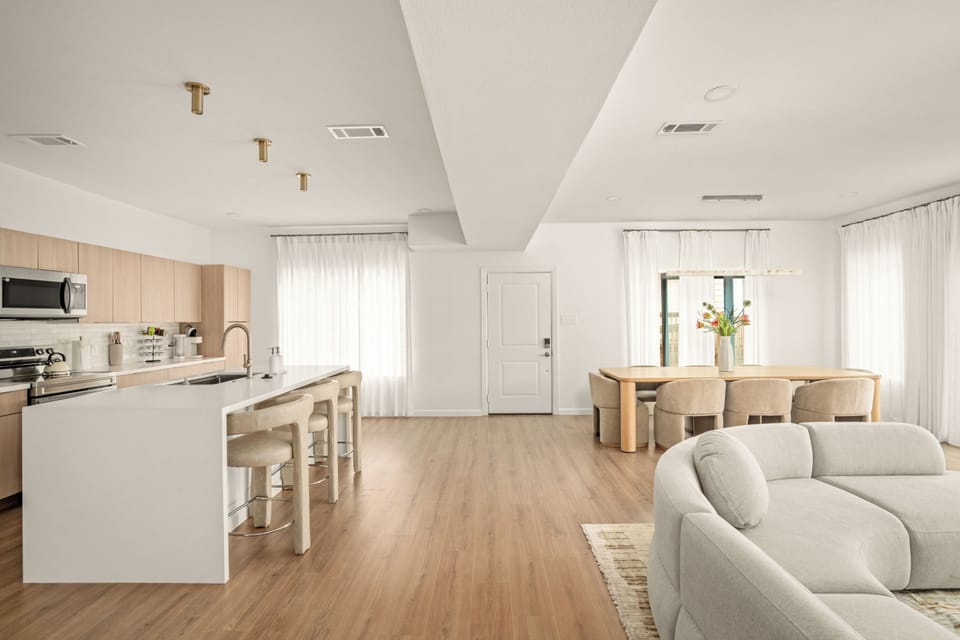 Generous dining space perfect for entertaining, with a warm and welcoming feel.