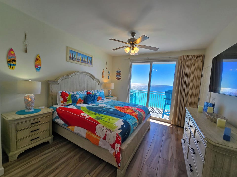 Direct master bedroom with king size bed and access to the balcony