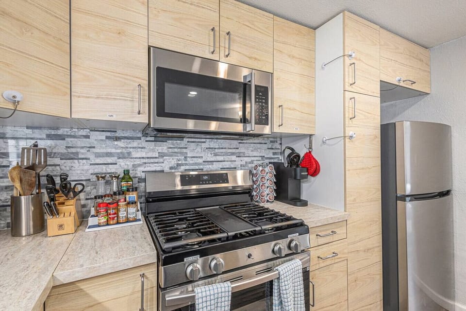 Whip up your favorite meals with the gas stove and microwave, fully equipped for every culinary adventure.