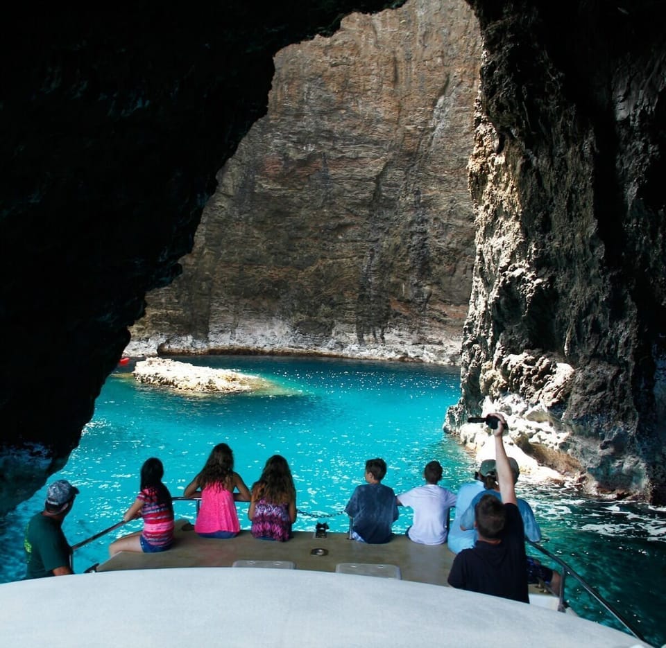 Captain J's Super Raft into the sea caves on the Napali Coast
