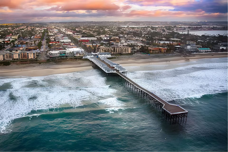 steps from the iconic Mission Beach pier, with shops, dining, and ocean views