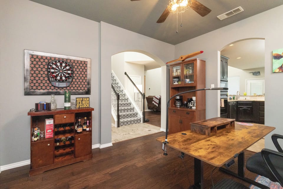 Office/game area - desk space, coffee cabinet, dartboard & area for fun games