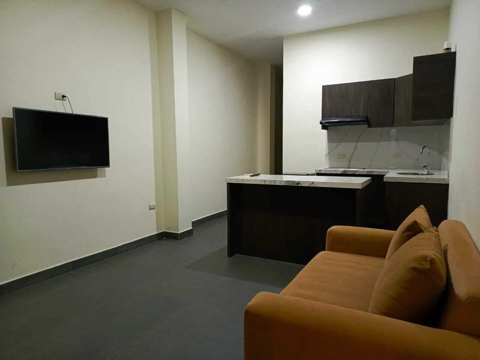 Standard Suite, Pool View | Living area | TV, heated floors