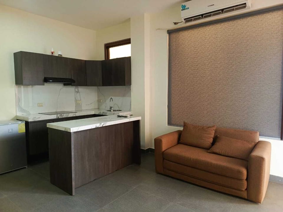 Standard Suite, Pool View | Living area | TV, heated floors