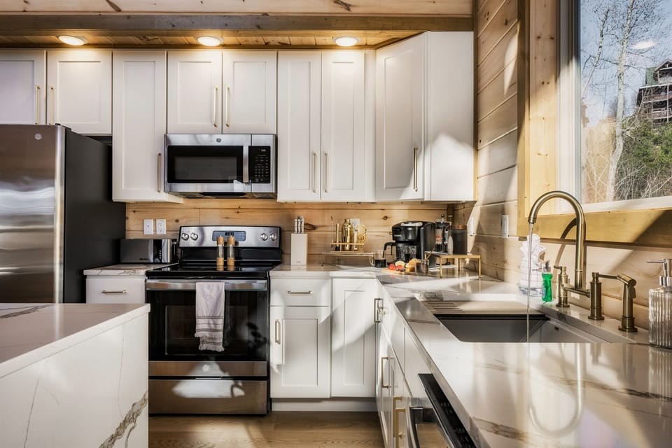Enjoy a modern, fully equipped kitchen with stainless appliances.