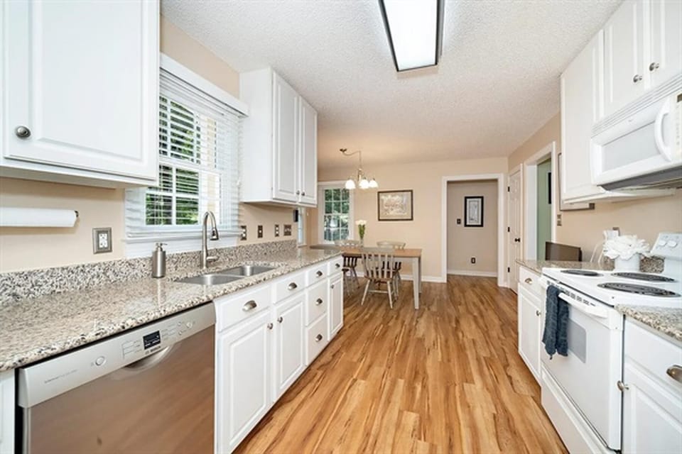 Open kitchen layout with ample counter space and natural light