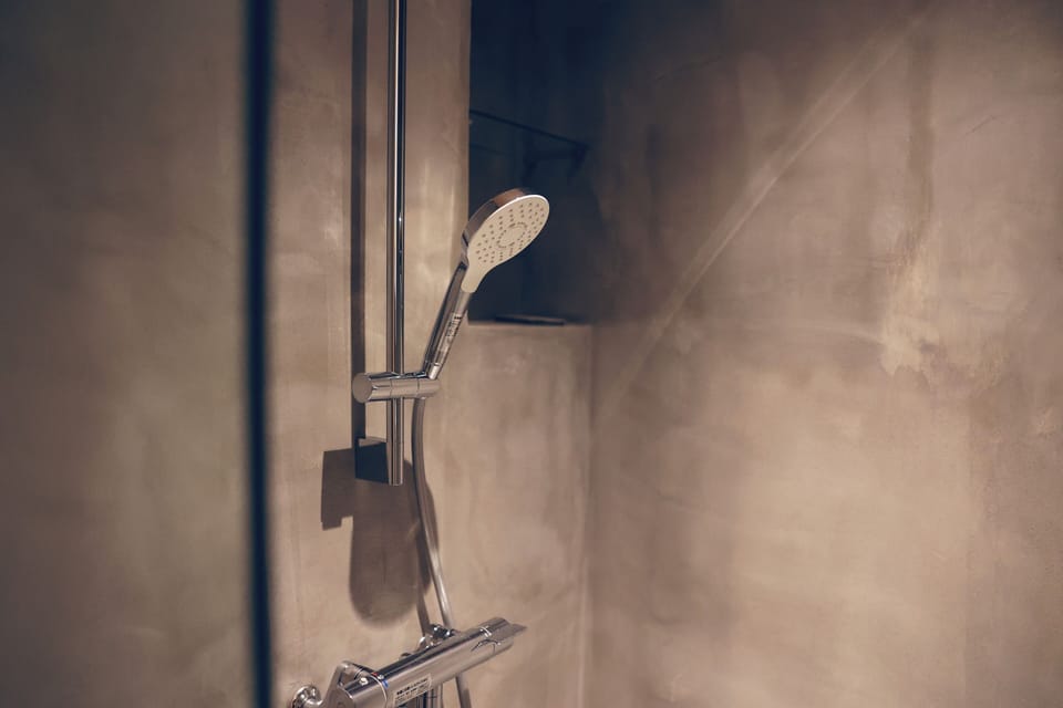 Bathroom | Shower, hair dryer, slippers, bidet
