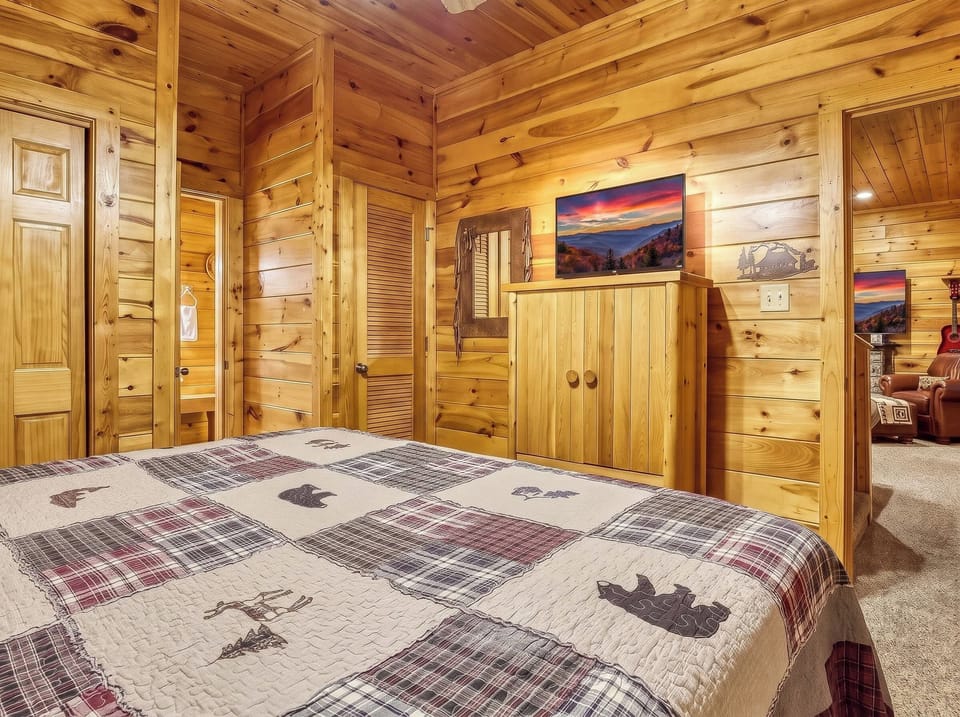 Enjoy easy access to the entertainment lounge directly from your lower-level king bedroom.