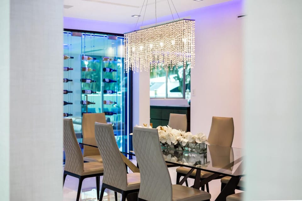 Custom dining space sophisticated lighting perfect for family celebrations.