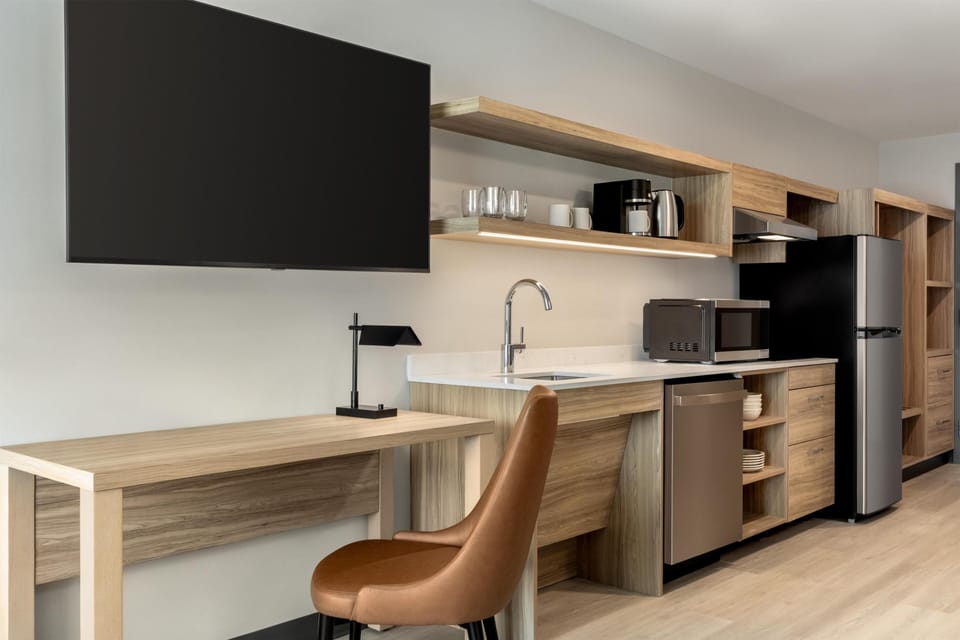 Desk, laptop workspace, blackout drapes, iron/ironing board