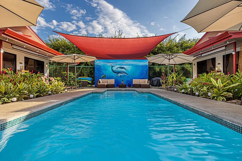 A picturesque poolside retreat perfect for relaxing outdoors.