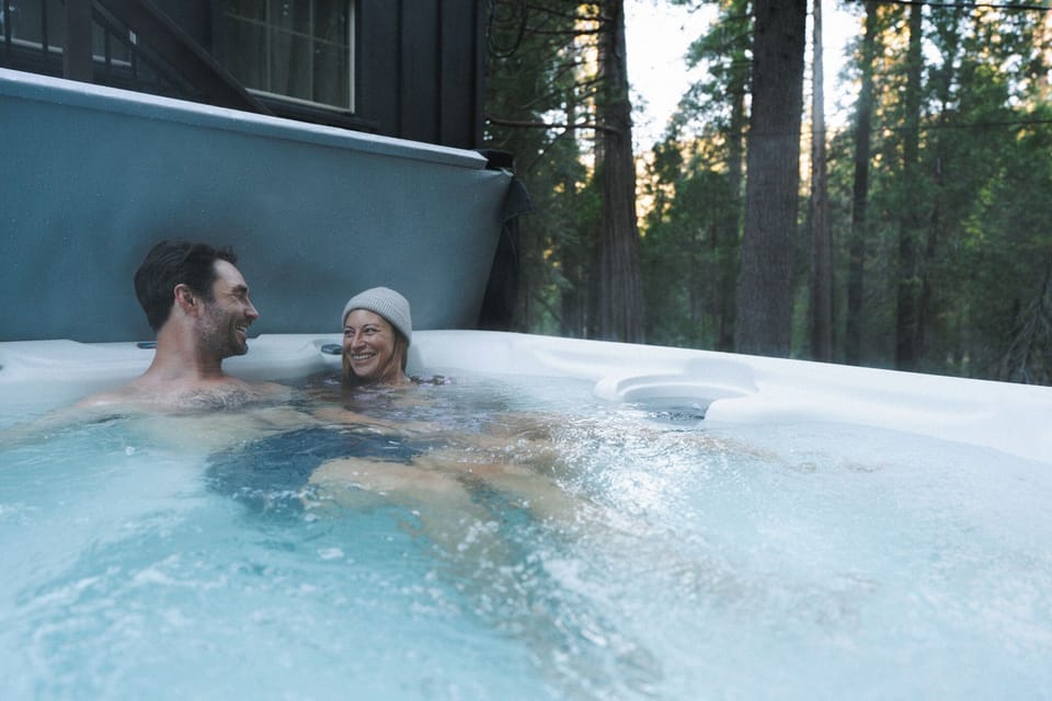 Relax in your own private hot tub surrounded by the forest.