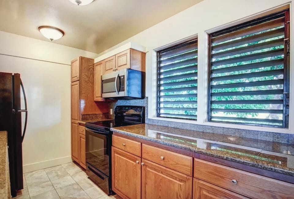 kitchen with oven, stove & microwave