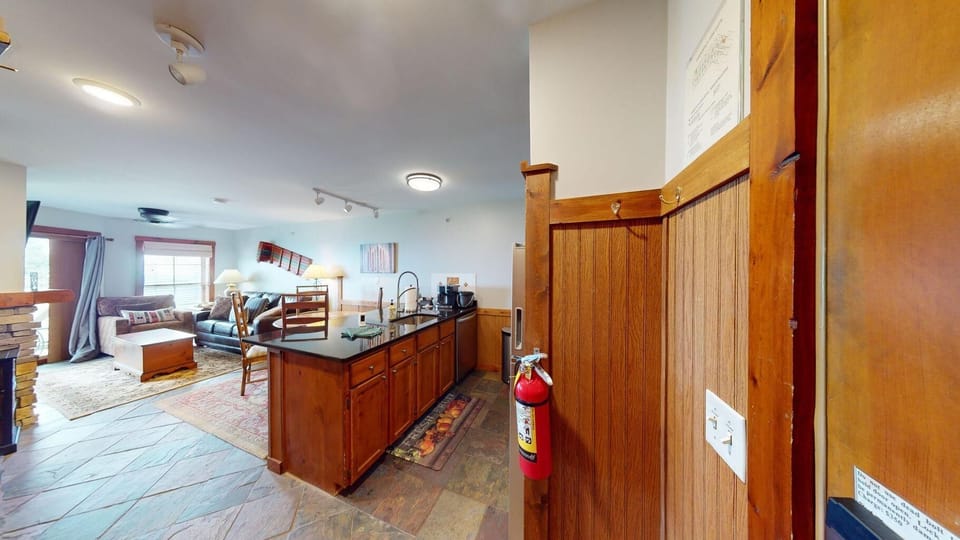 Spacious open-concept living and kitchen area with natural light