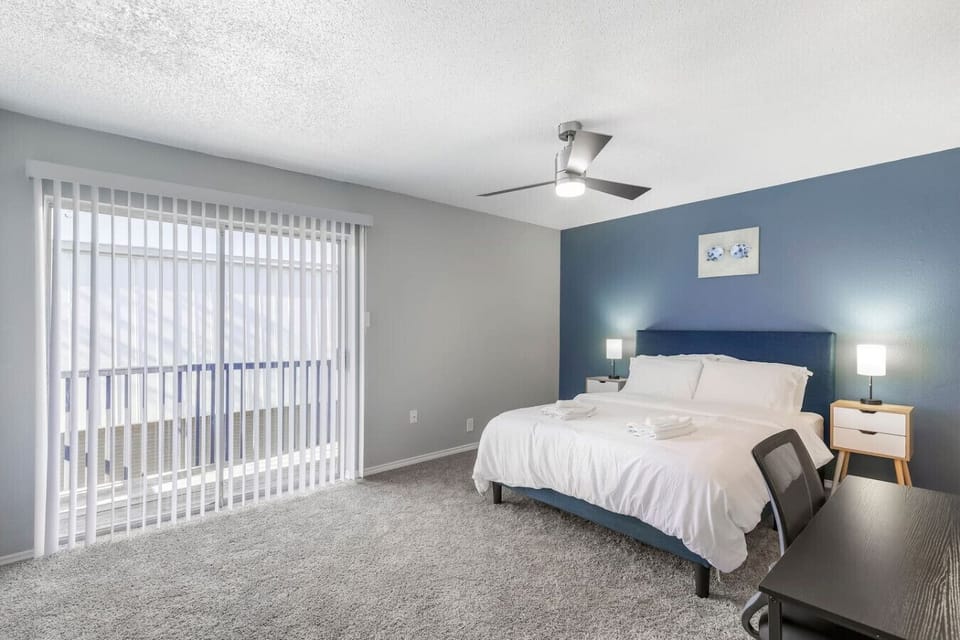 Comfortable and modern bedroom designed for a restful stay near AT&T Stadium. Features a plush bed, fresh hotel-quality linens, and a relaxing setup perfect after game days, concerts, or long travel days.
