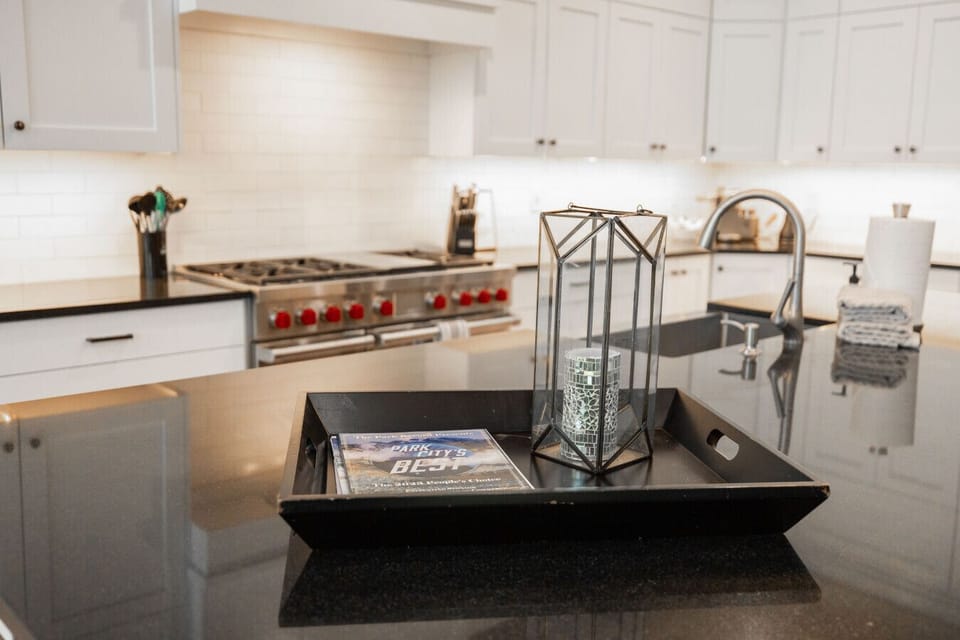 The kitchen’s ready for what you need: coffee, snacks, or just a cozy chat at the island.