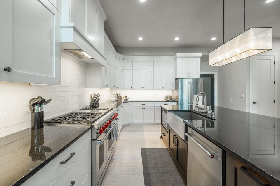 Another angle of the kitchen, tons of counter space and modern appliances throughout.