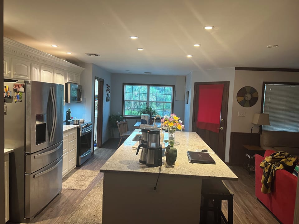Back door entrance and island in kitchen