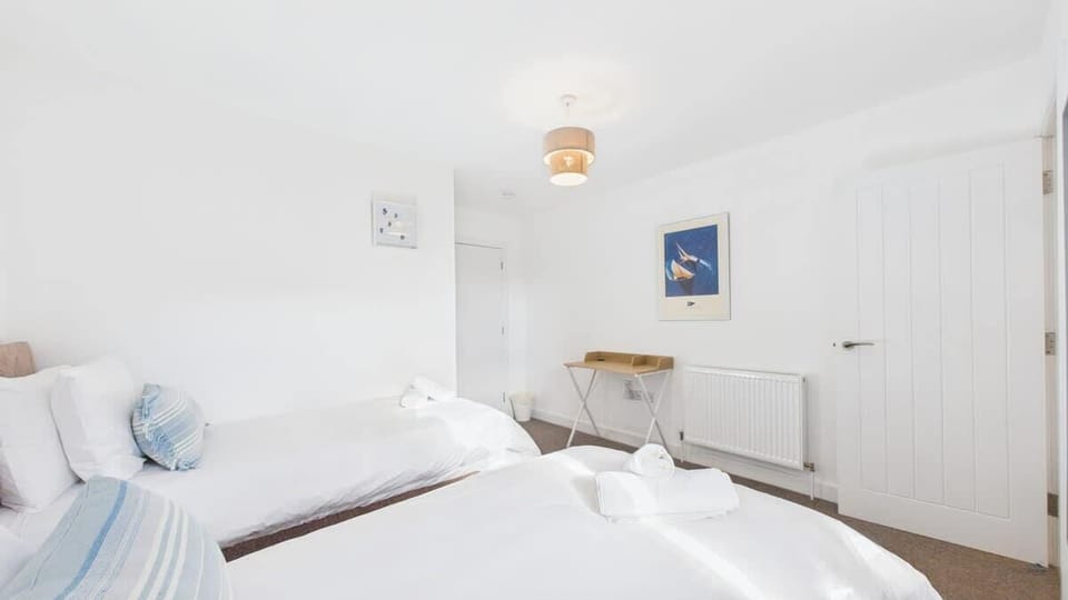 A second angle showing the generous layout and natural light in this family-friendly room.Can be made into a king upon request.