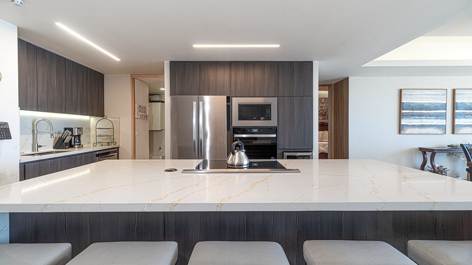seats at the kitchen island.