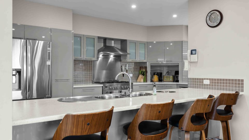 Cozy seating by the kitchen counter