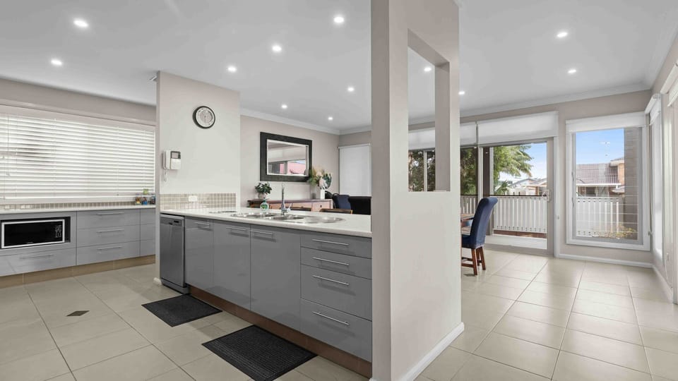 Open-plan kitchen offering a comfortable and functional cooking space