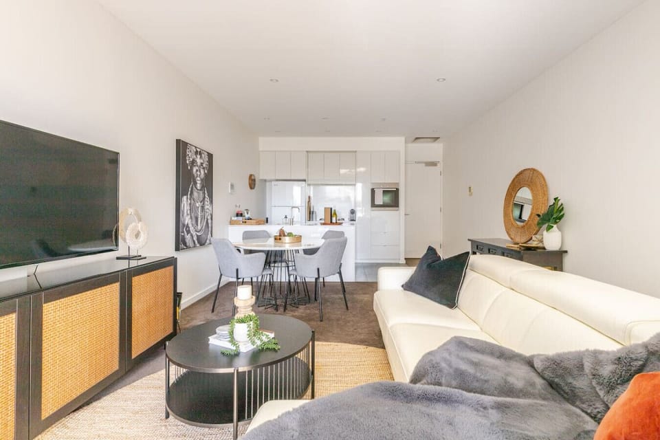 Relax on the comfy 4-seater leather couch with adjustable headrests. Watch some TV or play with the kids with various toys and games stored in the cupboards