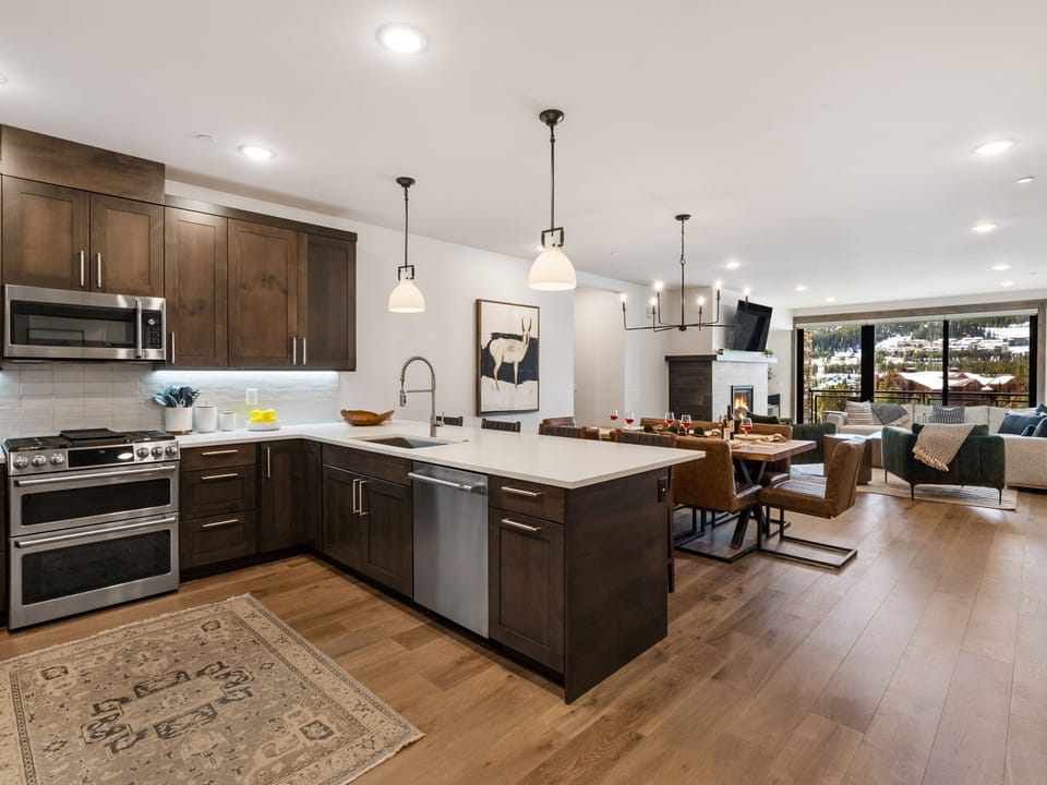 Kitchen with full-size appliances and breakfast bar
