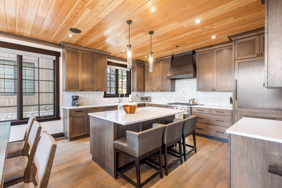 Kitchen (main floor): Drip coffee maker, Crockpot, blender, toaster oven, waffle maker, cooking utensils, tableware