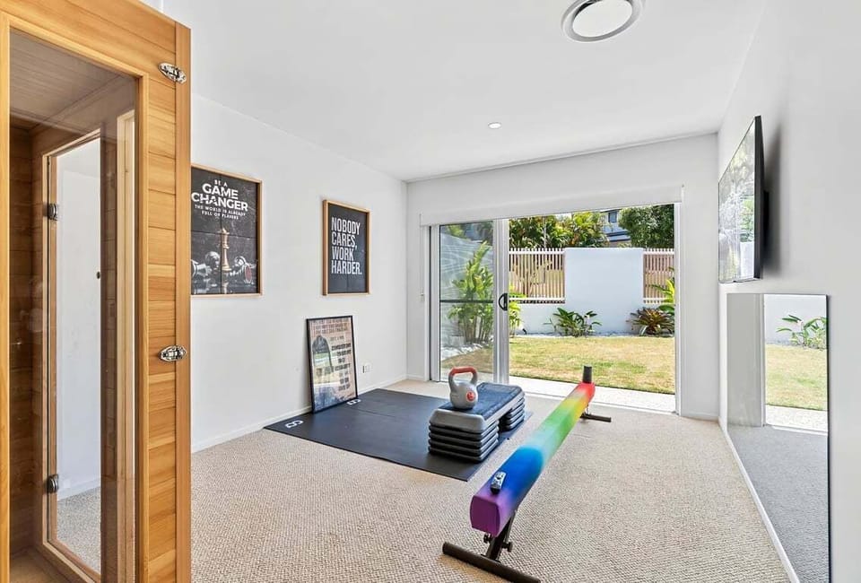 Ground floor room includes sauna and mini gym, perfect for yoga