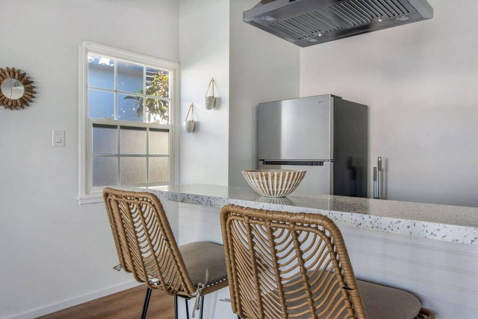 Bright kitchen and dining nook with plenty of natural light — ideal for morning coffee or casual meals.