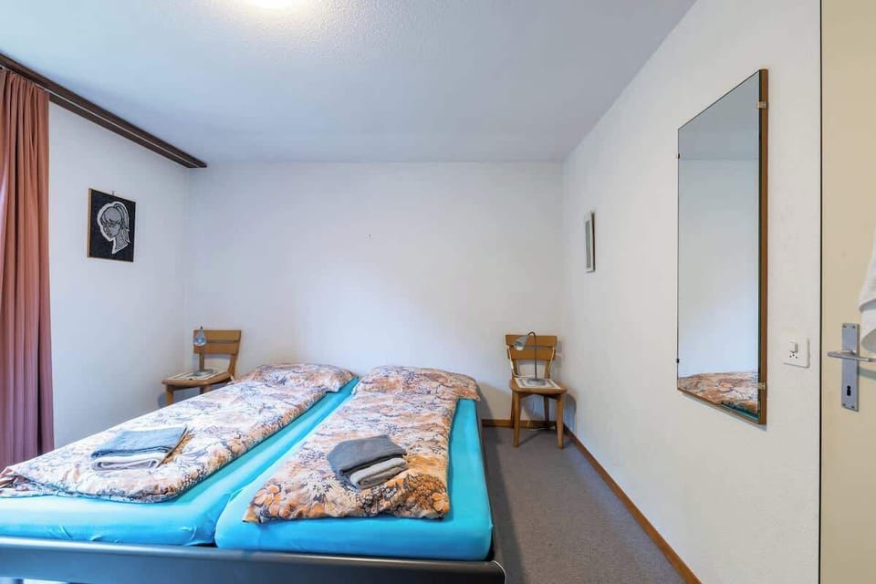 Minimalist bedroom with comfortable double bed