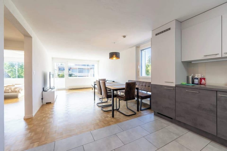 Modern kitchen with dining space and clean design