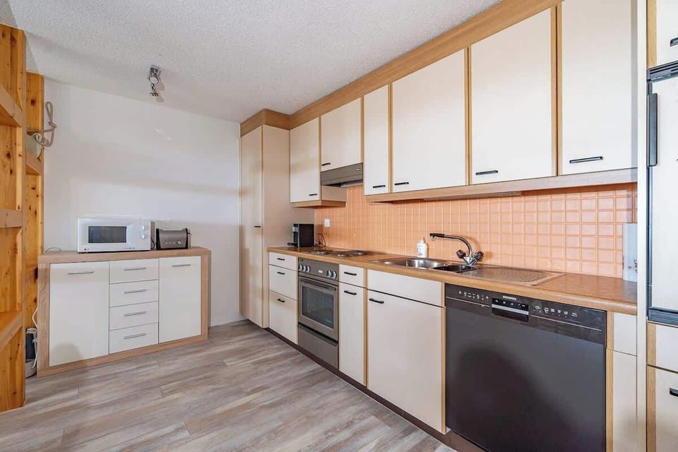 Fully equipped kitchen with modern appliances