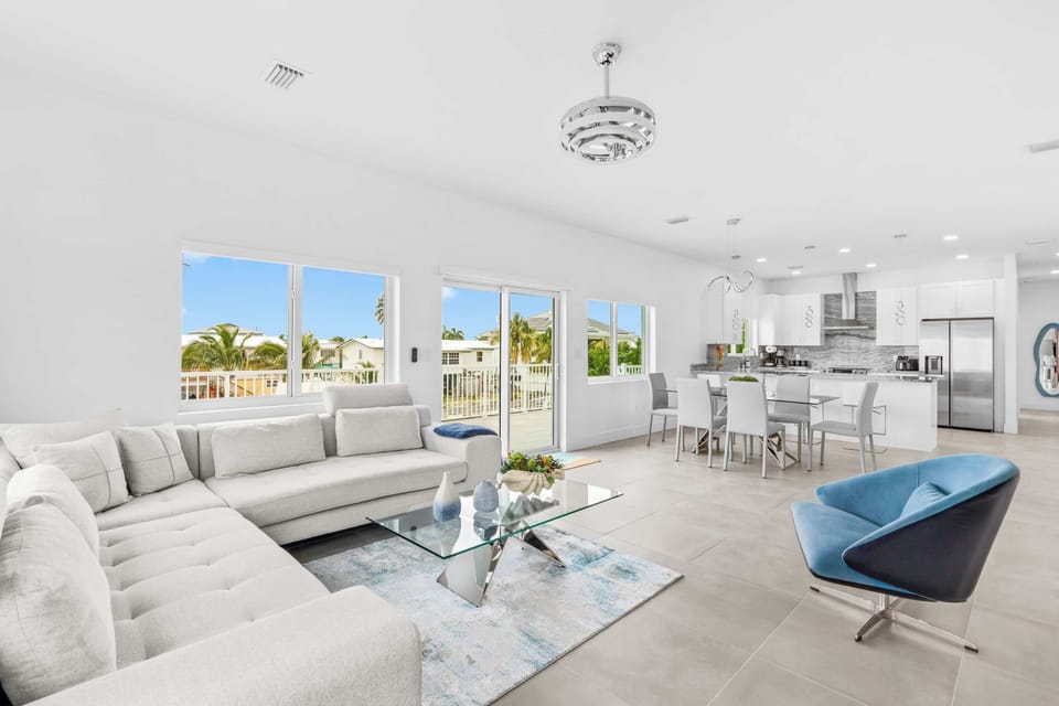 Bright open-concept living with panoramic water views and plenty of space to relax.