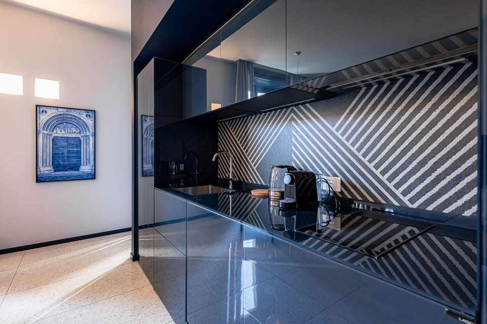 Apartment, City View | Private kitchen | Full-size fridge, microwave, stovetop, dishwasher