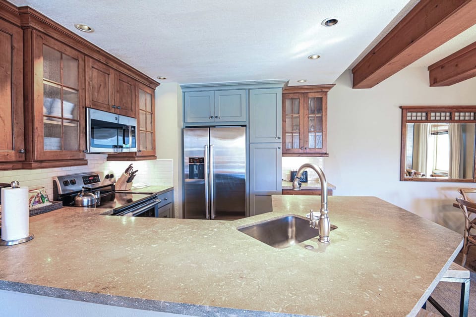 【Breakfast Bar】Kitchen counter seats 3 — coffee + waffles before first chair | Listed with @BookTraverse