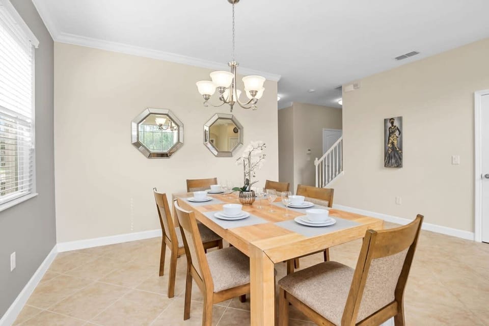 Dining Area With Modern Decor And Large Table