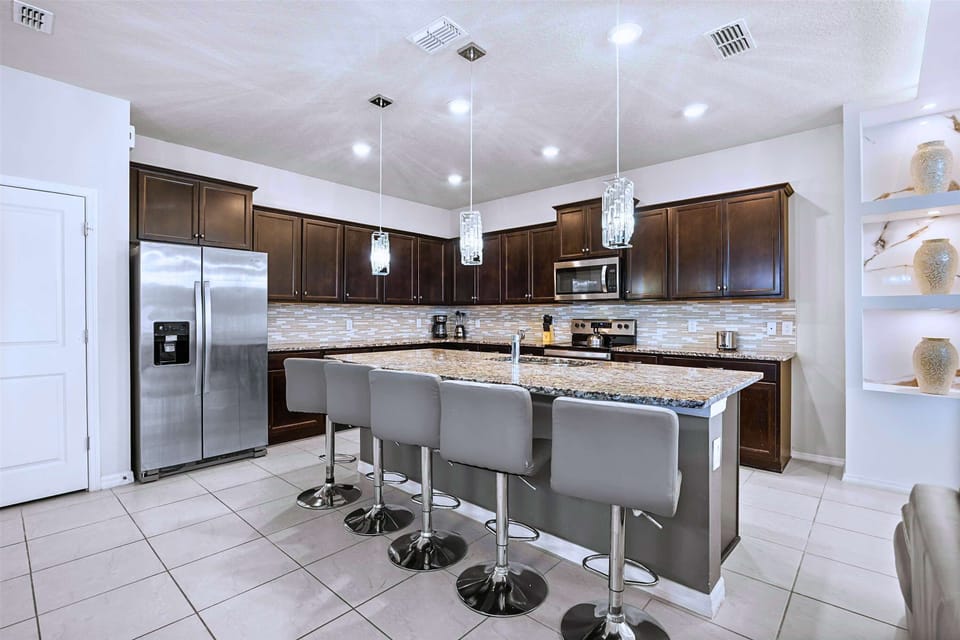Gourmet kitchen with centred island and bar seating