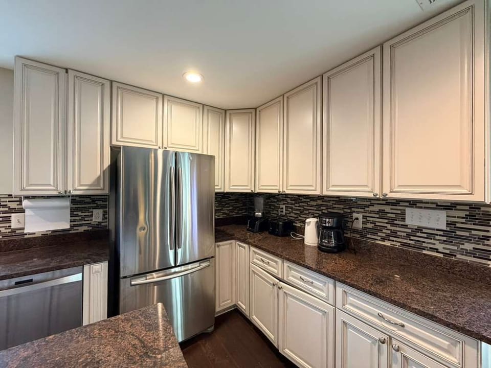 Fully stocked kitchen with cookware, utensils, and everything needed for home-cooked meals.