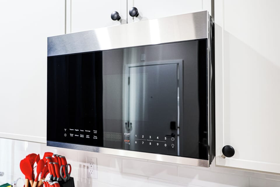 Whip up meals effortlessly in this functional kitchen area.

