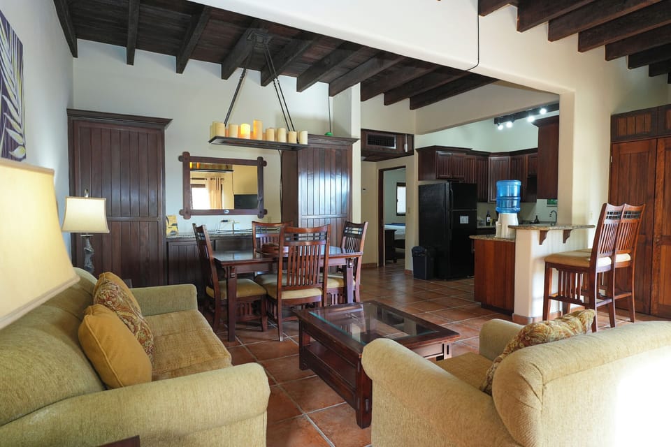 Luxury Condo, Executive Level | Living area | Flat-screen TV