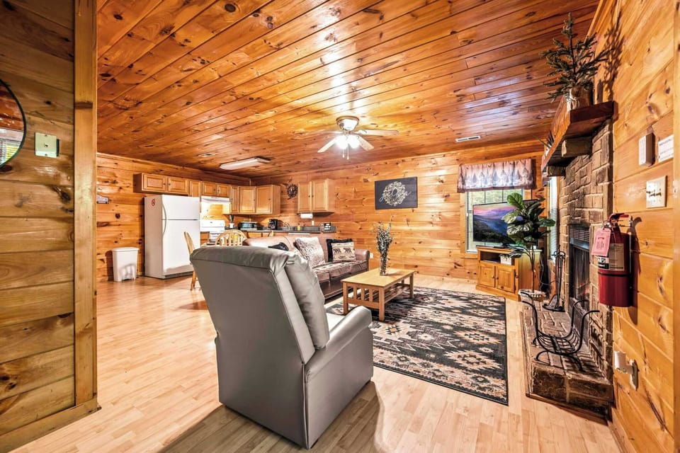 Cozy living area with fireplace, Smart TV, and retro gaming!