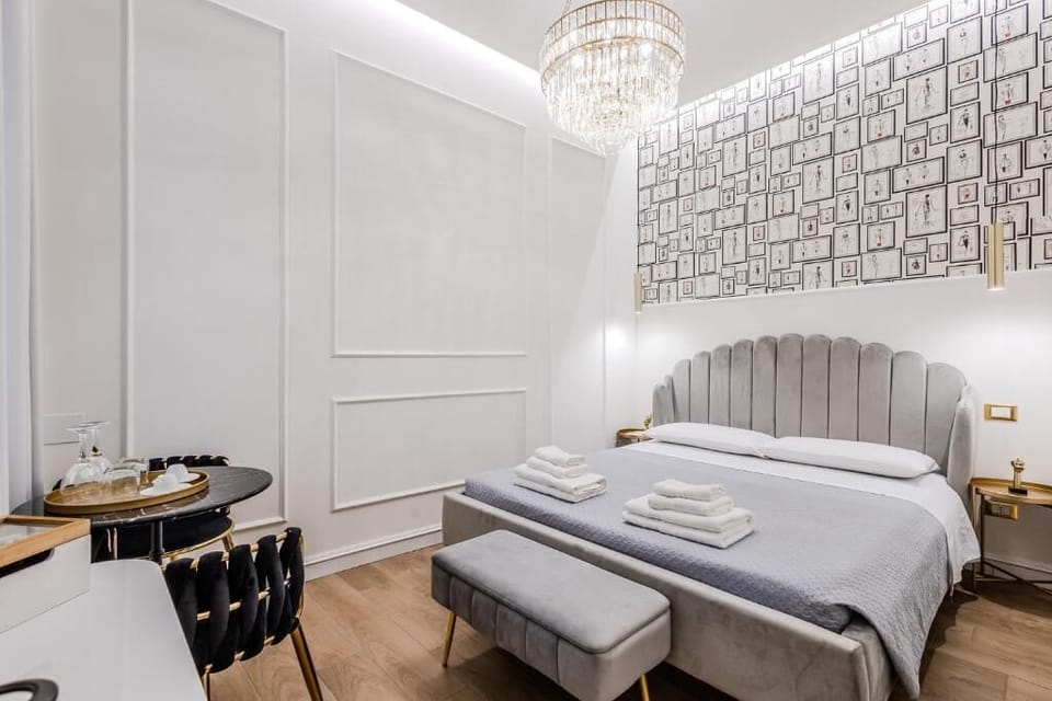 Junior Suite, 1 Queen Bed, Private Bathroom | In-room safe, desk, soundproofing, free WiFi