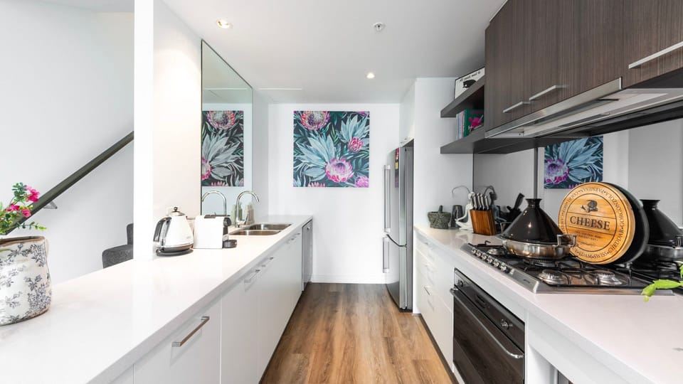 Sleek kitchen with ample counter space and stylish finishes